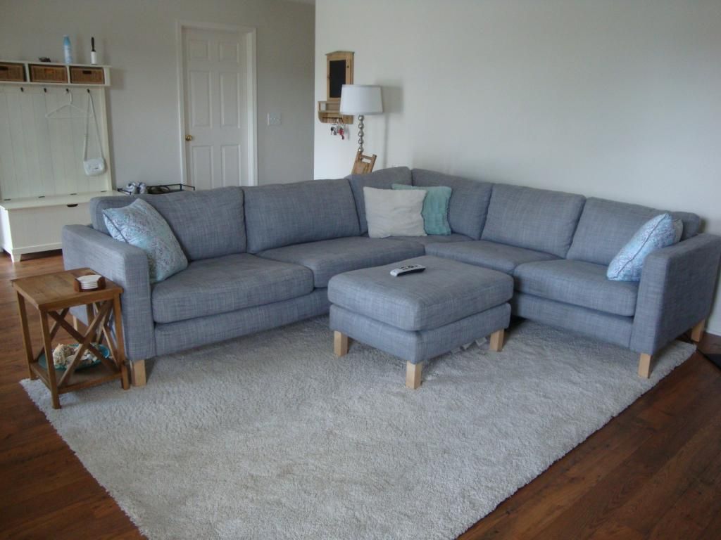 Door Couch & Empty Waiting Room With A Modern Gray Sofa In Front Of The